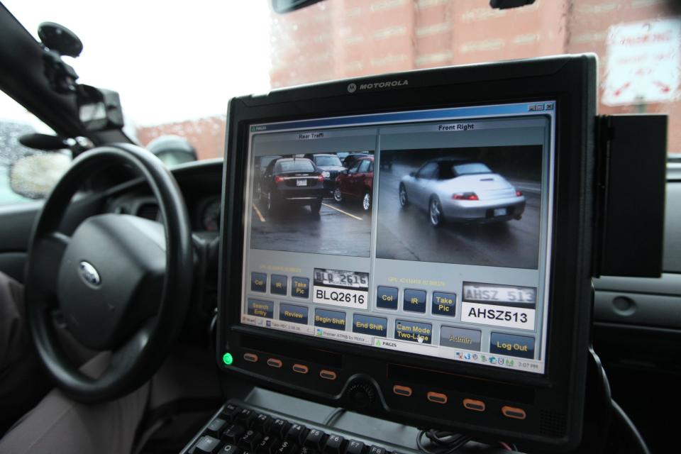 A screen inside the cruiser of a Macomb County Sheriff's deputy displays the the results of an automatic license plate reader scan in this October 2013 file photo. Detroit police adopted the use of mobile and stationary license plate readers in 2018, and on Sept. 26, 2023, approved a $5 million expansion that will add an 100 more cameras at 25 intersections.