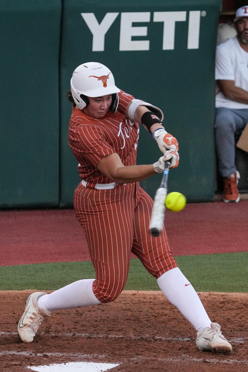 Texas freshman Katie Stewart takes a swing during the Longhorns' win over Houston Christian last month. Stewart made school history by becoming the first player in a game to nail a newly built apartment complex behind the left-field wall during Monday's win over Penn State. Texas, now No. 1 in the national polls, will open Big 12 play this weekend in Houston.