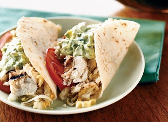 <strong>Get the <a href="http://www.huffingtonpost.com/2011/10/27/fish-tacos-with-creamy-li_n_1058389.html" target="_hplink">Fish Tacos with Creamy Lime Guacamole and Cabbage Slaw</a> recipe from Matthew Hranek via Food & Wine</strong>