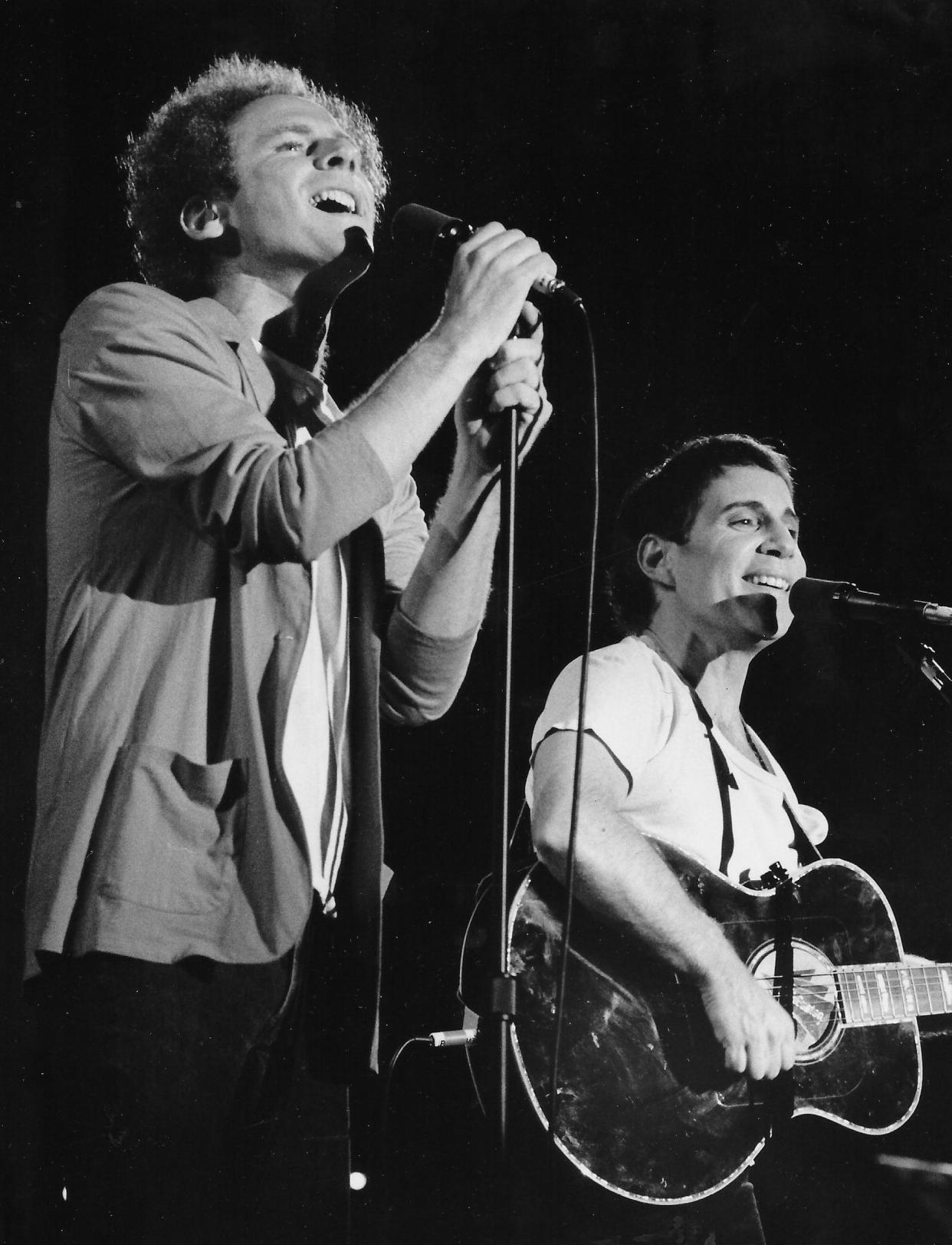 Art Garfunkel and Paul Simon perform July 19, 1983, at the Rubber Bowl in Akron.