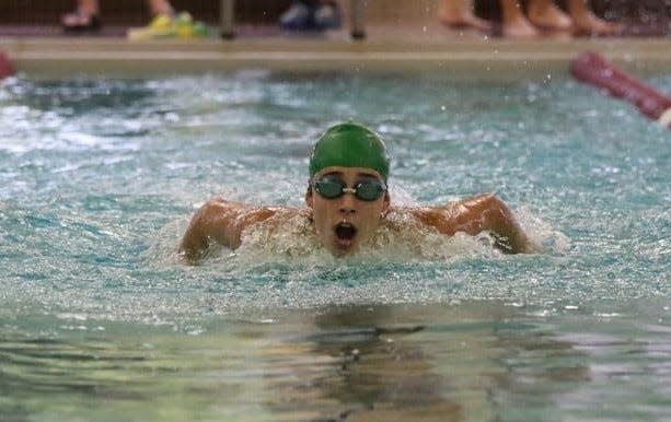 Riley Chevalier swims for Flat Rock during a win over New Boston Huron Taylor Tuesday.