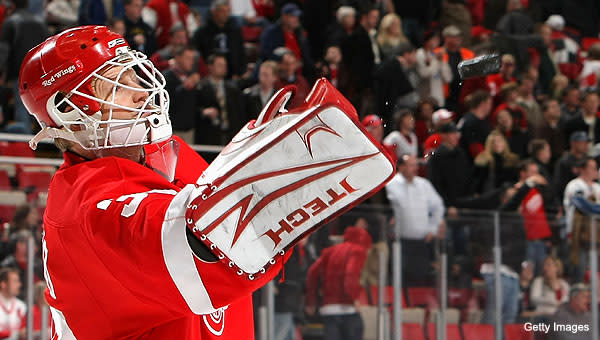 Detroit Red Wings goalie Chris Osgood skates during warm ups at