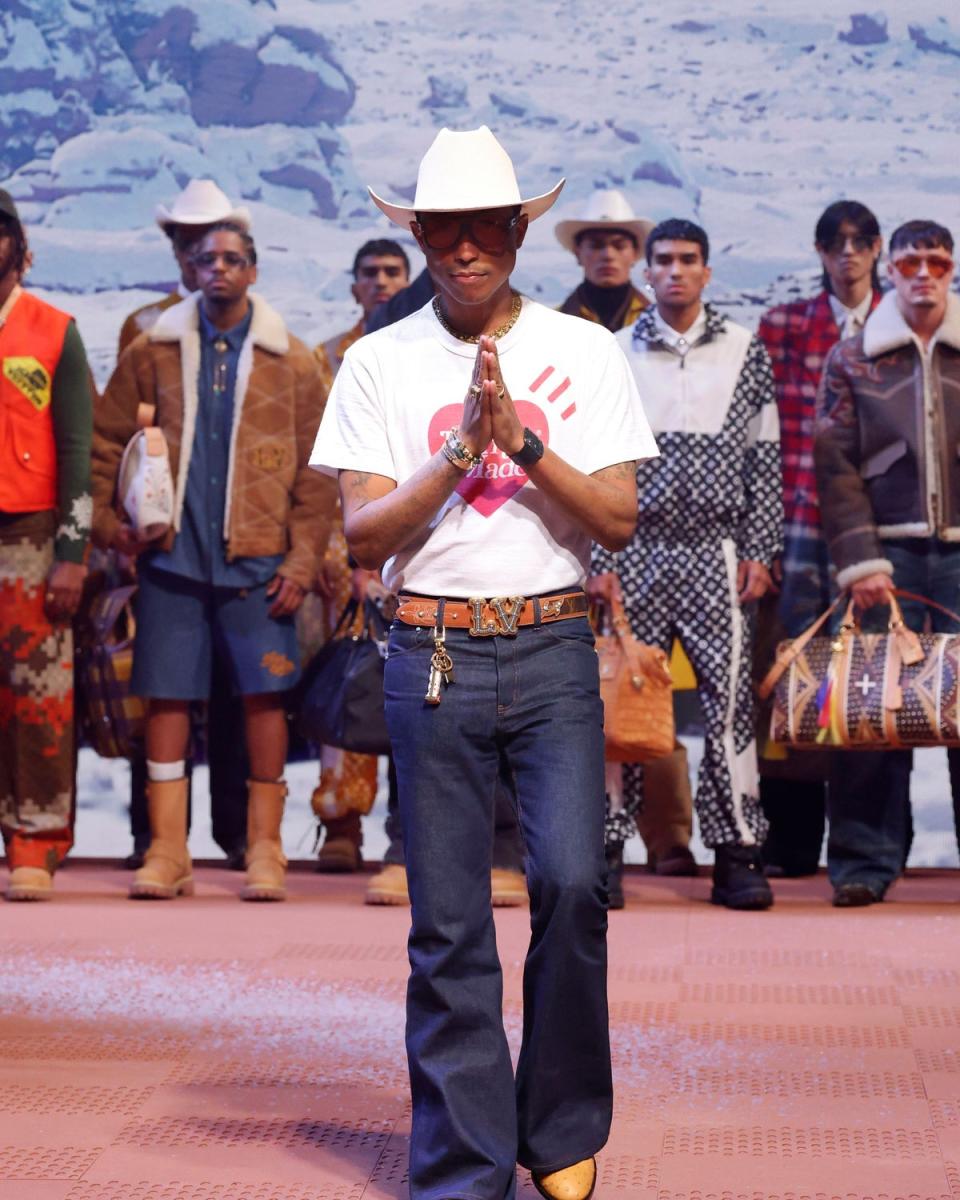 Pharrell Williams takes a out after his second Louis Vuitton show (LOUIS VUITTON)