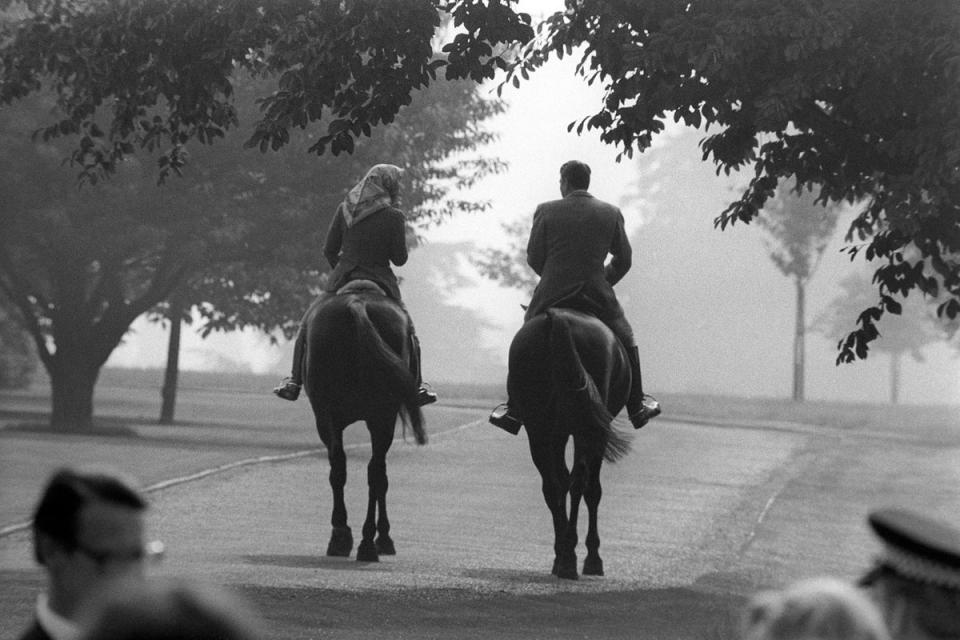 Queen Elizabeth and President Reagan out riding in Windsor Home Park in June 1982 (PA)