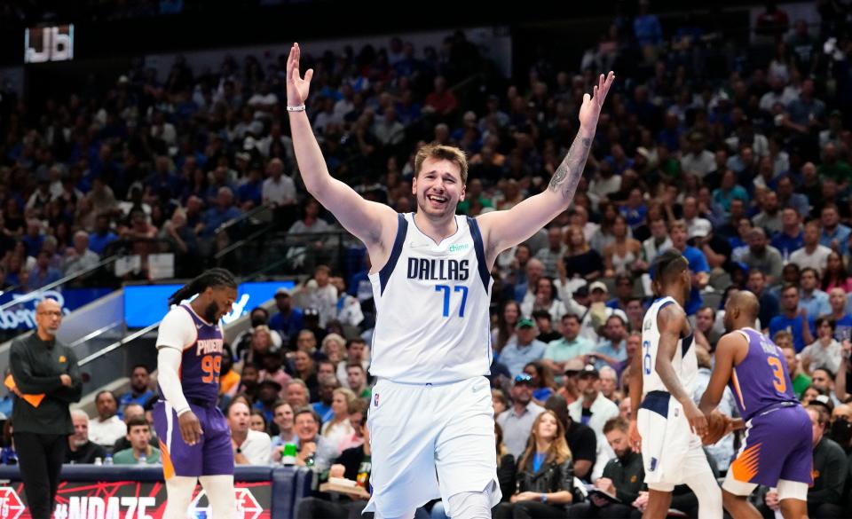 Mavericks guard Luka Doncic delebrates after Dallas beat the Phoenix Suns in Game 3.