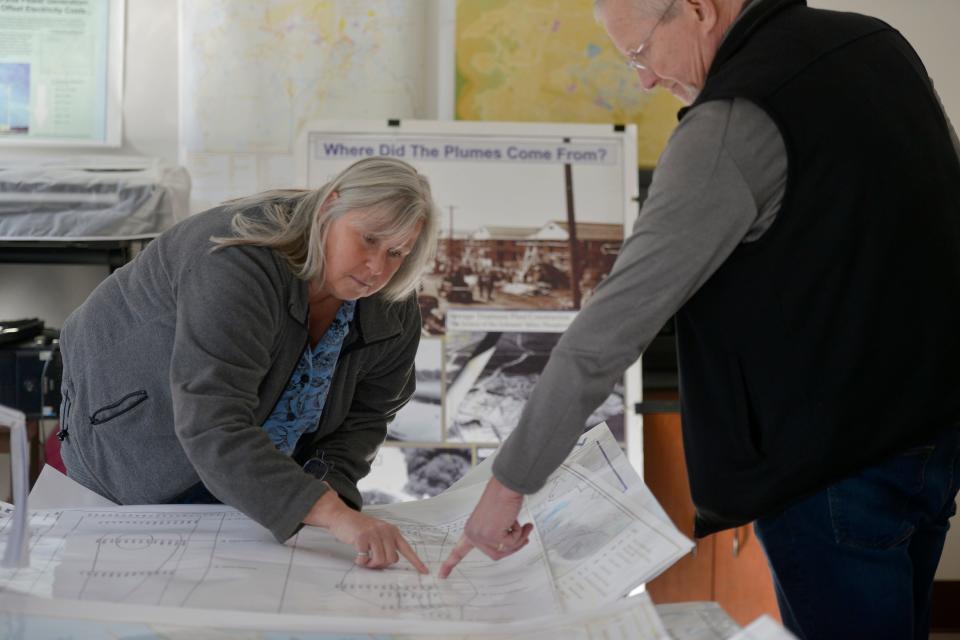 Rose Forbes, remediation program manager for the Air Force Civil Engineer Center at Joint Base Cape Cod, left, and Air Force Center Community Involvement Lead Douglas Karson talk on Tuesday about what one of the PFAS plumes around Joint Base Cape Cod and the mitigation efforts being taken.