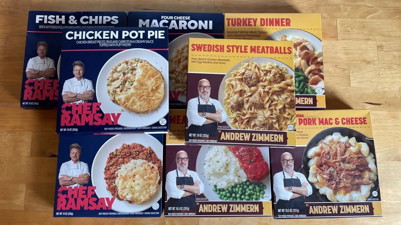 Boxes of Chef Ramsay and Andrew Zimmern frozen meals piled