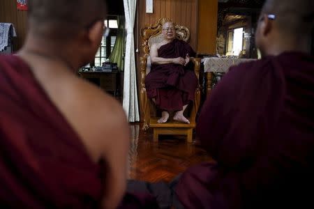 Ashin Tilawkar Biwonsa (C), 77, Ma Ba Tha's founder and chairman, talks during a meeting at Ma Ba Tha's head office in Yangon August 26, 2015. REUTERS/Soe Zeya Tun