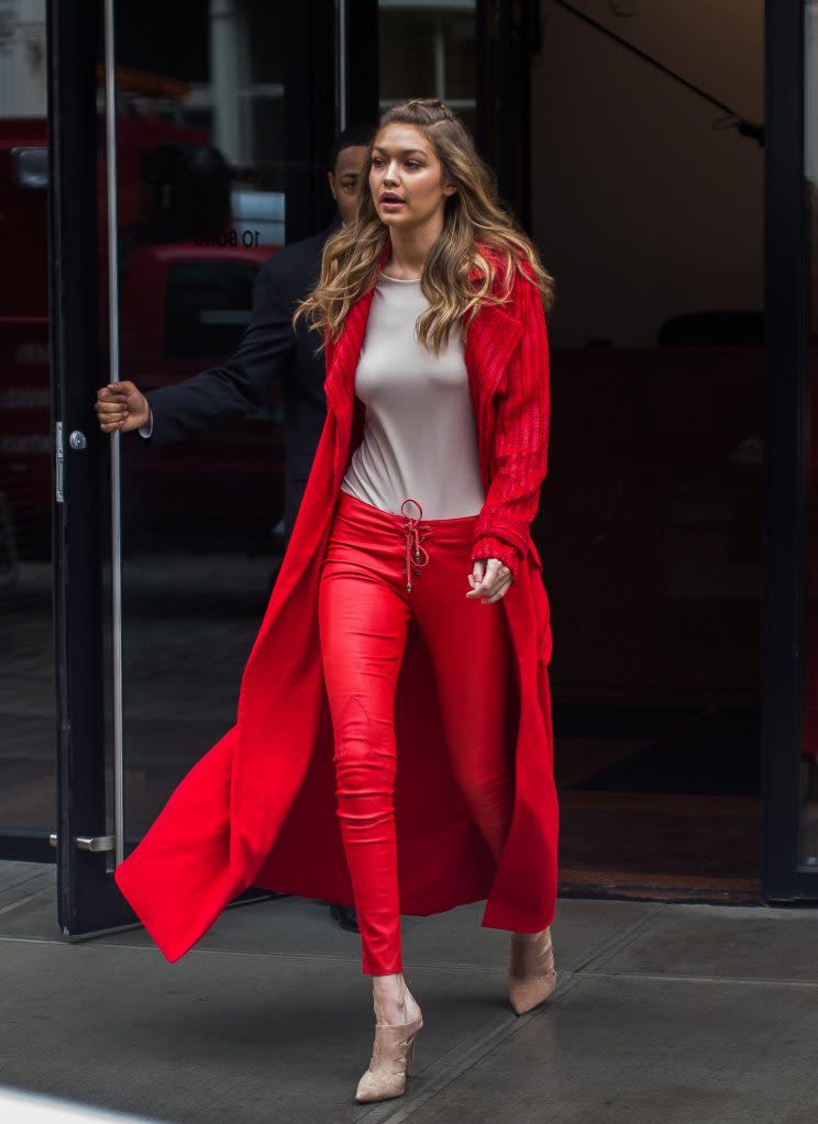 Hadid was spotted in a red statement coat earlier this year during NYFW. (Photo: Getty Images)