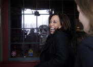 Democratic presidential candidate Sen. Kamala Harris, D-Calif., laughs with reporters as she arrives at the Common Man Restaurant for lunch in Concord, N.H., Monday, Feb. 18, 2019. (AP Photo/Elise Amendola)