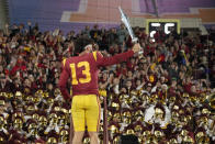 Southern California quarterback Caleb Williams leads the USC Marching Band after USC defeat UCLA 48-45 in an NCAA college football game Saturday, Nov. 19, 2022, in Pasadena, Calif. (AP Photo/Mark J. Terrill)