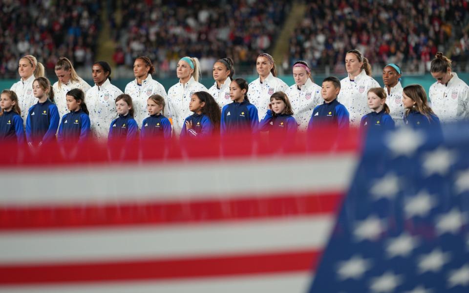 The US women's team refuses to sing the national anthem as eight players remain silent before the Portugal game