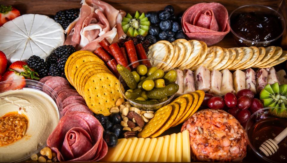 A completed charcuterie board for a "Girls Night" made by Serena Shumate Thursday afternoon at her home in Ocala. Shumate started The Charcuterie Mama in October. She falls under the Cottage Food Law where she can resell food that was prepackaged.