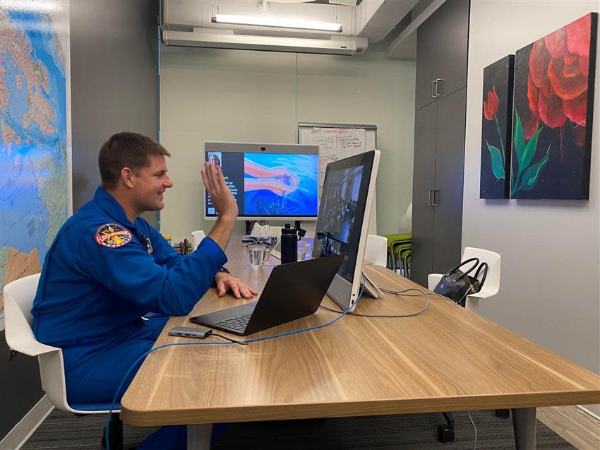 Jeremy Hansen talked to kids at 14 schools in remote communities in Ontario, Nunavut and Yukon on Tuesday.  (Canadian Space Agency - image credit)