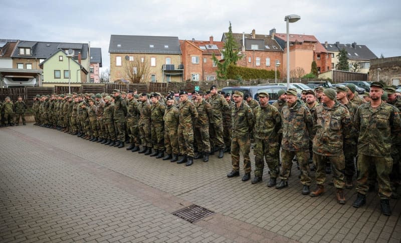 Germany's soldiers attend a briefing before their deployment. Germany's armed forces are facing significant personnel problems as the ranks age and the military struggles to win new recruits, according to a damning report presented to parliament on Tuesday. Jan Woitas/dpa