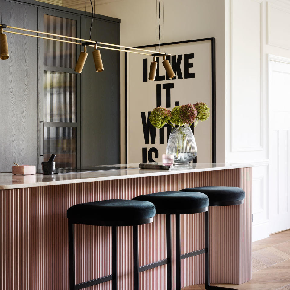 kitchen with pink breakfast bar pink kitchen island black cabinets