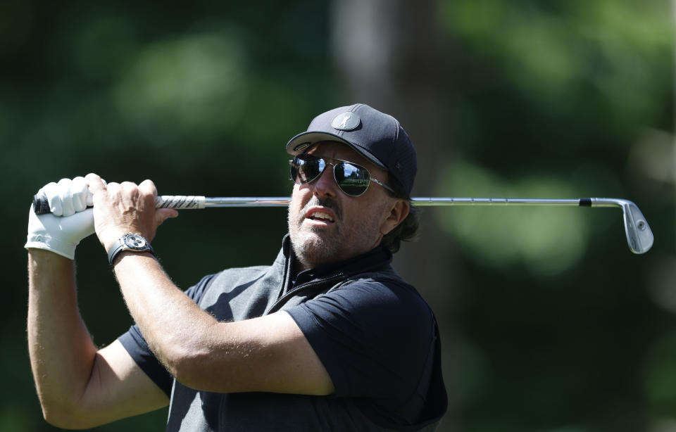 Phil Mickelson in action during the Pro-Am at the Centurion Club, Hertfordshire, England, ahead of the LIV Golf Invitational Series, Wednesday June 8, 2022. (Steven Paston/PA via AP)