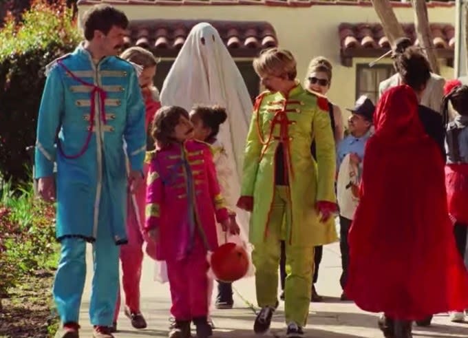 Scarlett Johansson and Azhy Robertson trick or treat as The Beatles