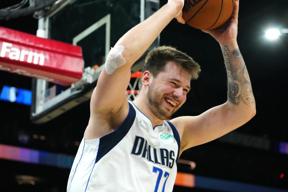 May 10, 2022; Phoenix, Arizona; USA; Mavericks Luka Doncic (77) reacts after being called for an offensive foul against the Suns during game 5 of the second round of the Western Conference Playoffs.