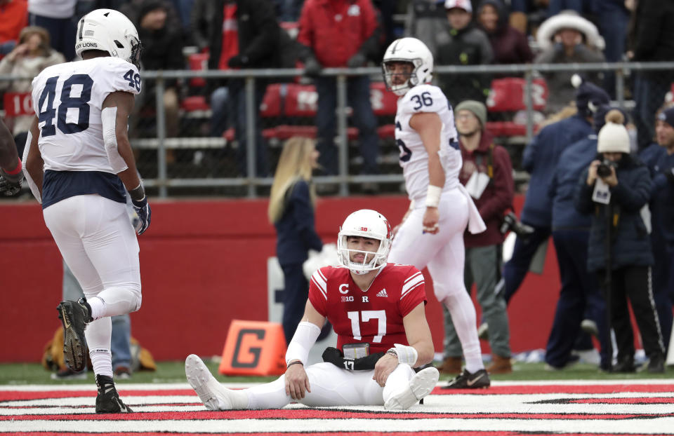 Rutgers quarterback Giovanni Rescigno (17) sits on the end zone after dropping a pass on a fourth down play against Penn State during the second half of an NCAA college football game, Saturday, Nov. 17, 2018, in Piscataway, N.J. (AP Photo/Julio Cortez)