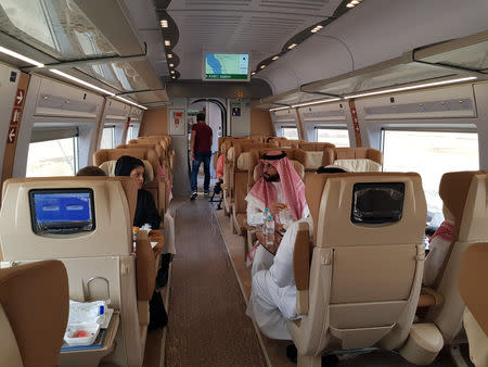 Saudi people are seen inside of the new Haramain speed train in Jeddah, Saudi Arabia September 18, 2018. REUTERS/Stephen Kalin