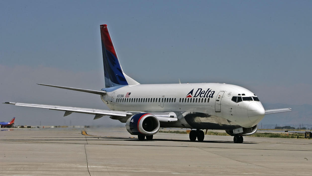 A Delta passenger claims that his pilot hit on him on Grindr — while they were in the air. (Photo: George Frey/Getty Images)