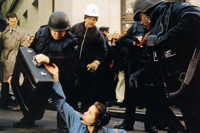 Angelina Jolie reaching for a briefcase in The Bone Collector (1999)