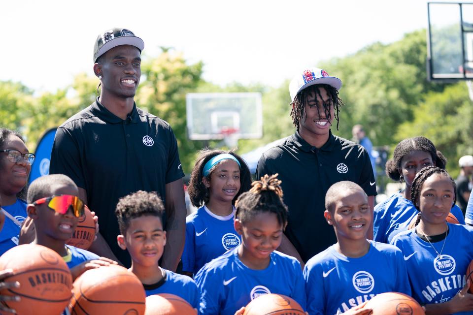 New Pistons Jalen Duren, left, and Jaden Ivey pose with the Boys and Girls Club after The Detroit Pistons introduce them as the two new draft picks Friday, June 24, 2022 at Rouge Park in Detroit.