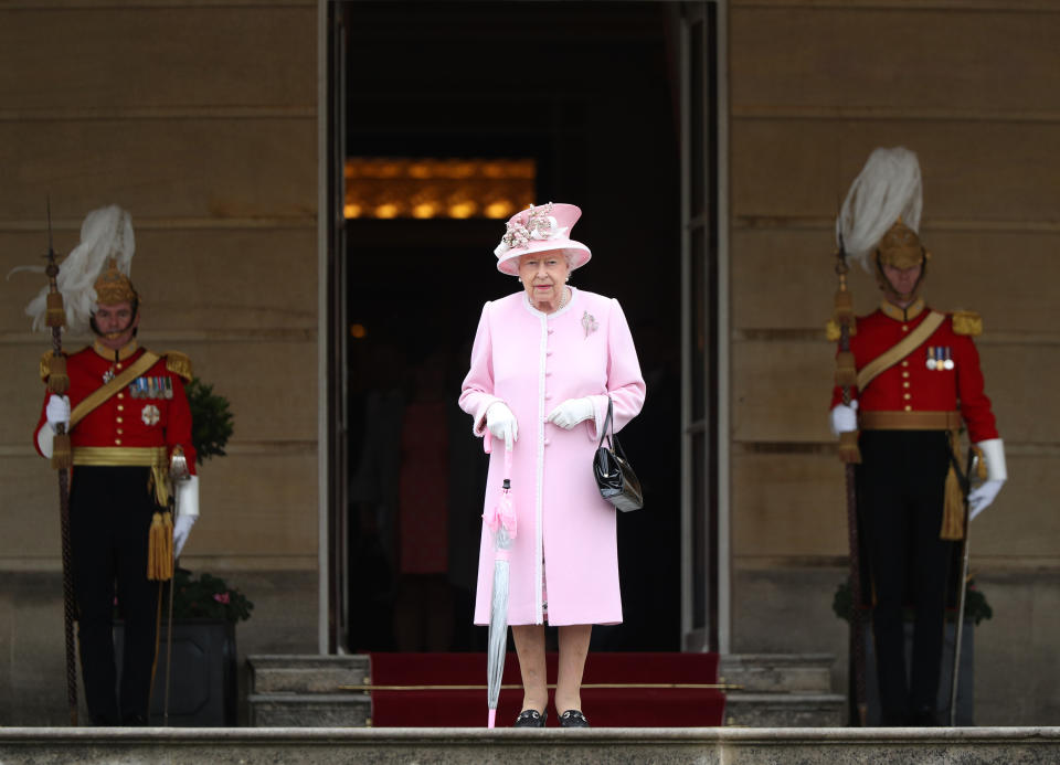 Britain's Queen Elizabeth II arrives at the Queen's Garden Party in Buckingham Palace, central London on May 29, 2019. (Photo by Yui Mok / POOL / AFP)        (Photo credit should read YUI MOK/AFP via Getty Images)