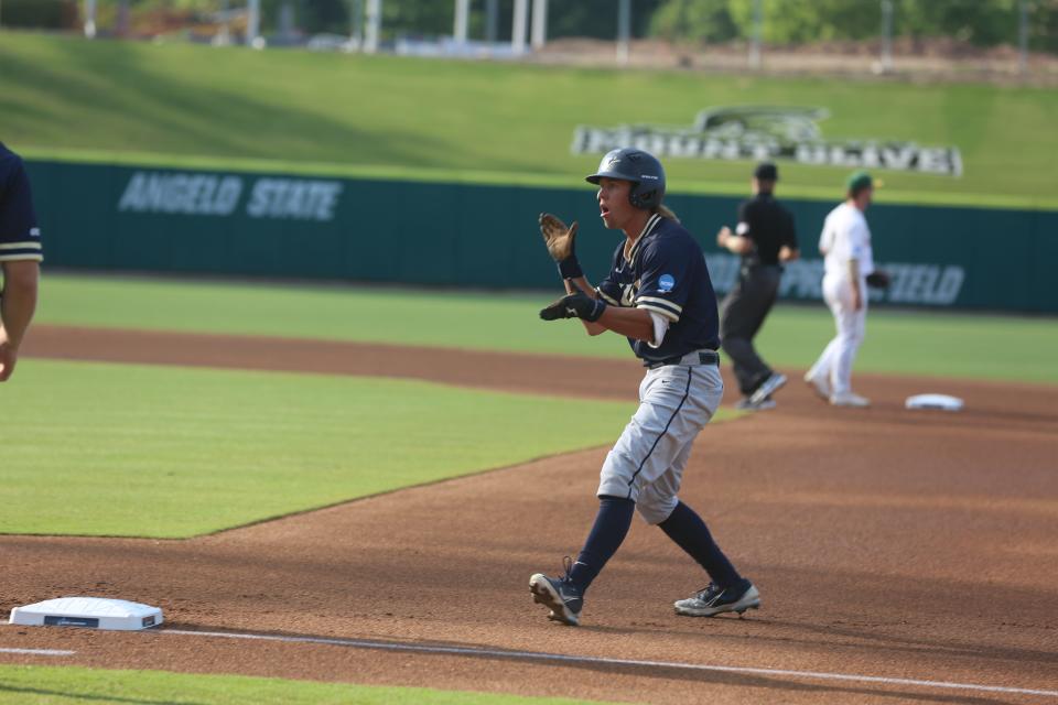 Illinois-Springfield leadoff hitter Asher Bradd reacts after hitting a first inning single in Monday's game at the NCAA Division II baseball championships in Cary, North Carolina.