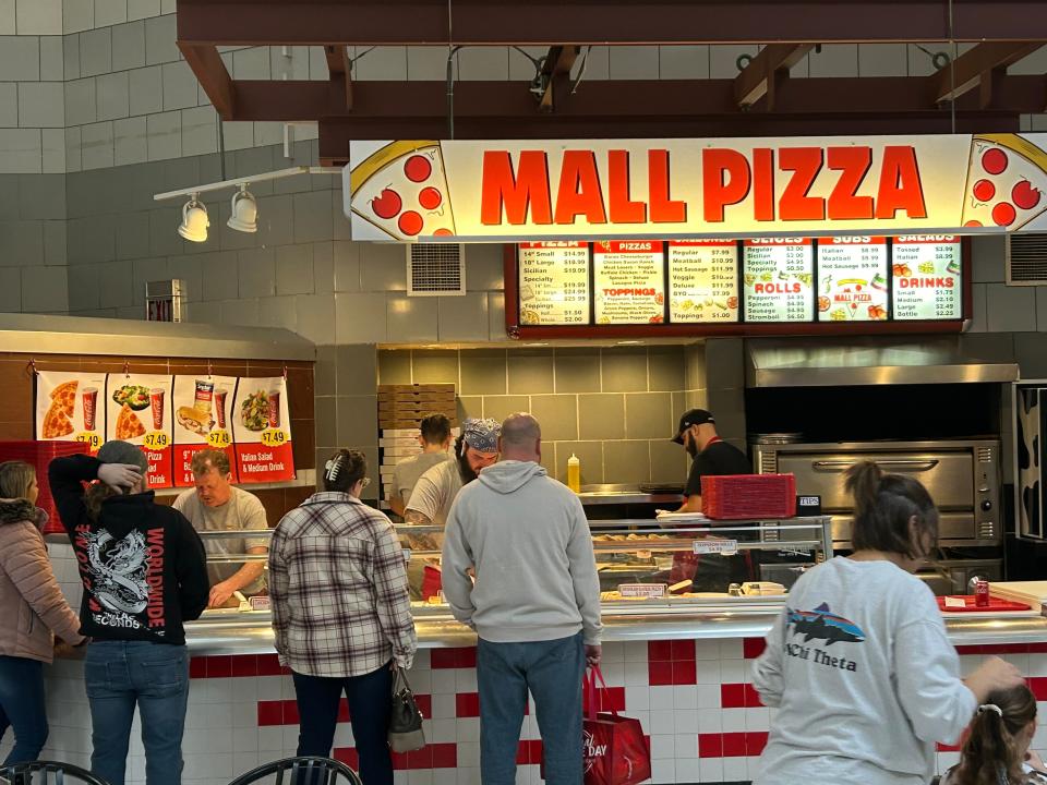 From the Beaver Valley Mall food court clear to JC Penney's, people lined up for Mall Pizza when it reopened in late November.