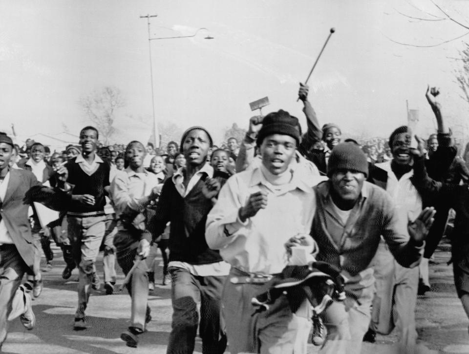 Black students protesting in Soweto, South Africa, in 1976. 