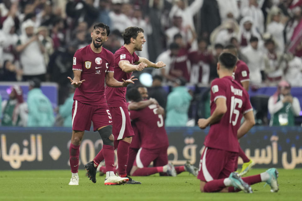 Qatar players celebrate at full time of the Asian Cup final soccer match between Qatar and Jordan at the Lusail Stadium in Lusail, Qatar, Saturday, Feb. 10, 2024. Qatar won 3-1. (AP Photo/Aijaz Rahi)