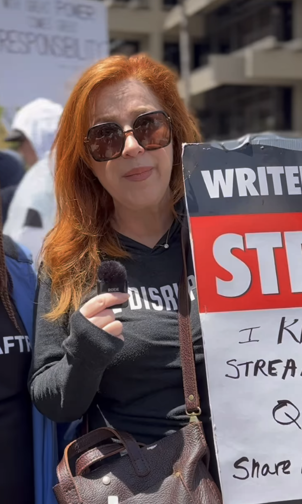 Closeup of Lisa Ann Walter protesting