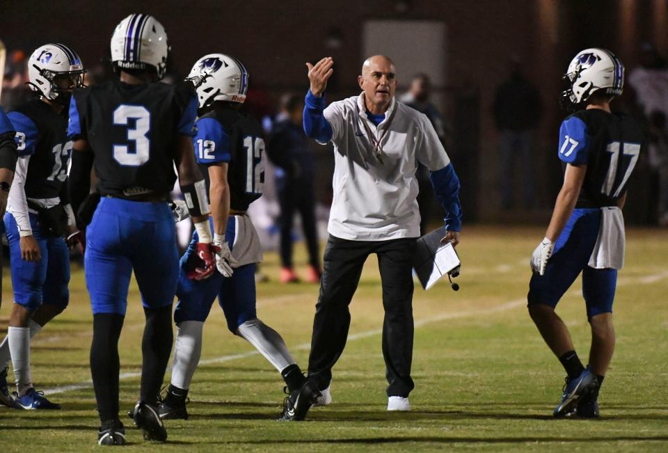 Demopolis head coach Lance Tucker signals to his team as they play Eufala at Demopolis High Friday, Nov. 24, 2023, in the state semifinal game.