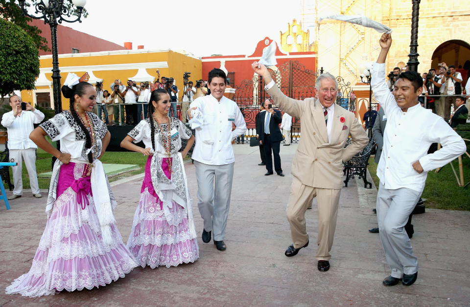 <p>During a trip to Campeche in Mexico back in November 2014, Prince Charles had a go at traditional Mexican clog dancing in Zocalo Square. <em>[Photo: Getty]</em> </p>