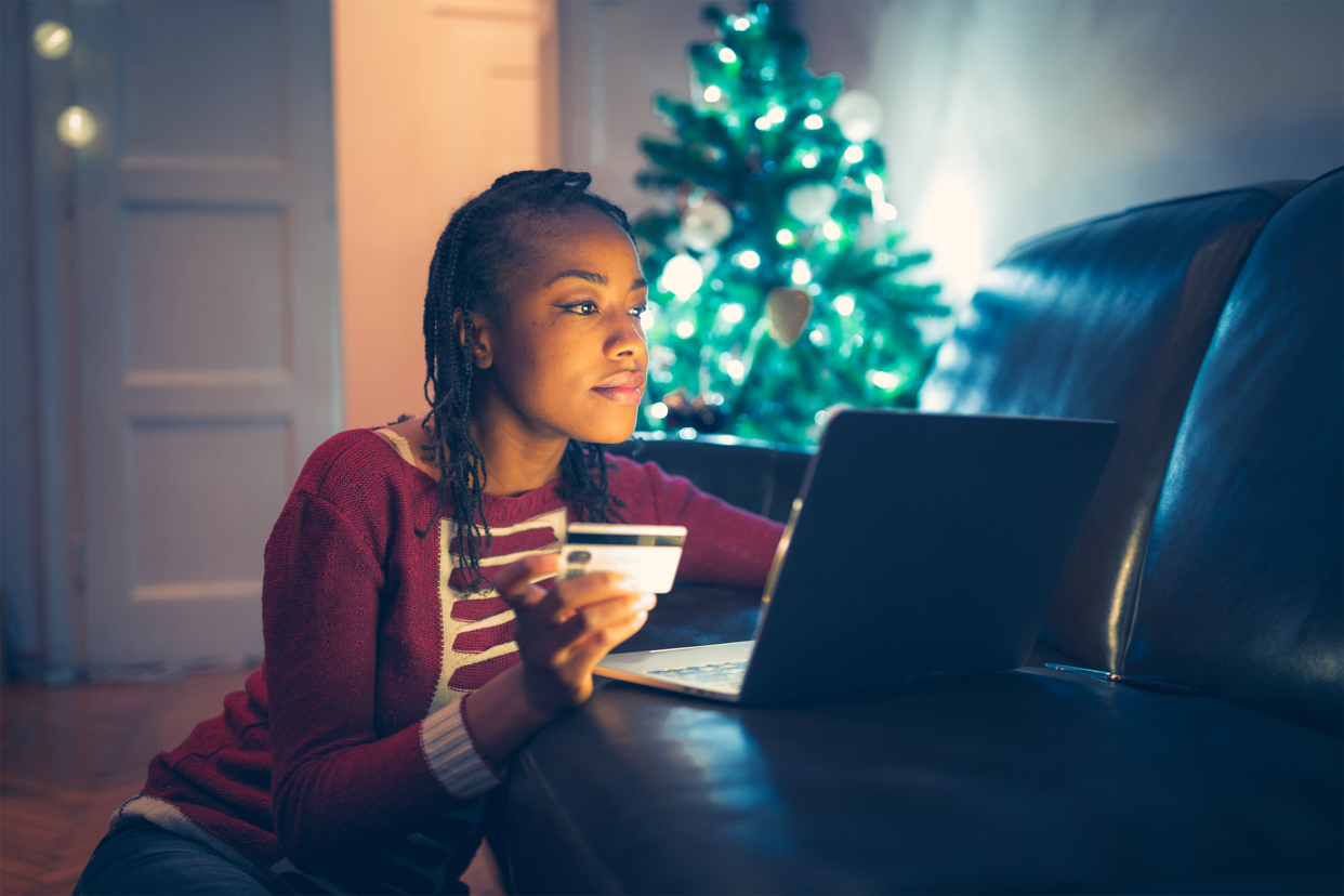 Woman online shopping during holidays