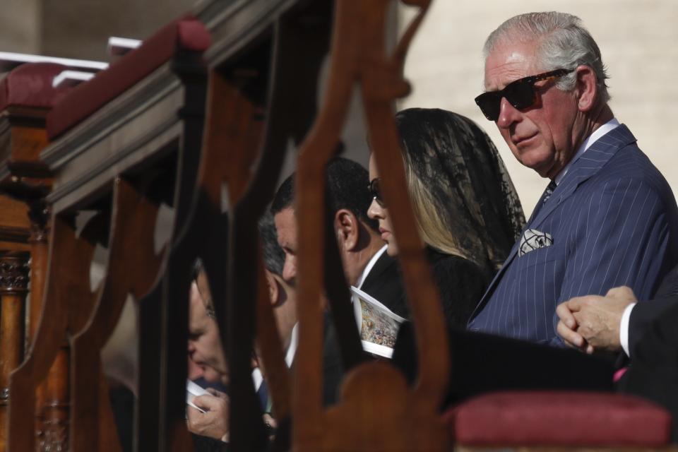 Britain's Prince Charles attends a canonization Mass in St. Peter's Square at the Vatican, Sunday, Oct. 13, 2019. Pope Francis canonizes Cardinal John Henry Newman, the 19th century Anglican convert who became an immensely influential thinker in both Anglican and Catholic churches, and four other women. (AP Photo/Alessandra Tarantino)