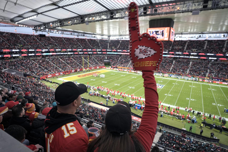 Kansas City Chiefs fans cheer as they watch their team play the Miami Dolphins during the first half of an NFL football game Sunday, Nov. 5, 2023, in Frankfurt, Germany. (AP Photo/Markus Schreiber)