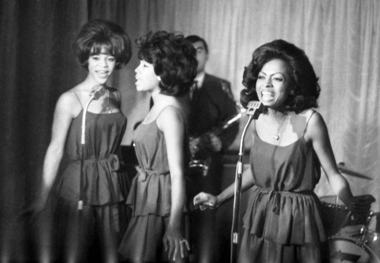 In this Oct. 8, 1964 file photo, The Supremes, from left, Florence Ballard, Mary Wilson and Diana Ross, perform during a reception for them in a hotel, in London. Wilson, the longest-reigning original Supreme, has died at 76 years old. 