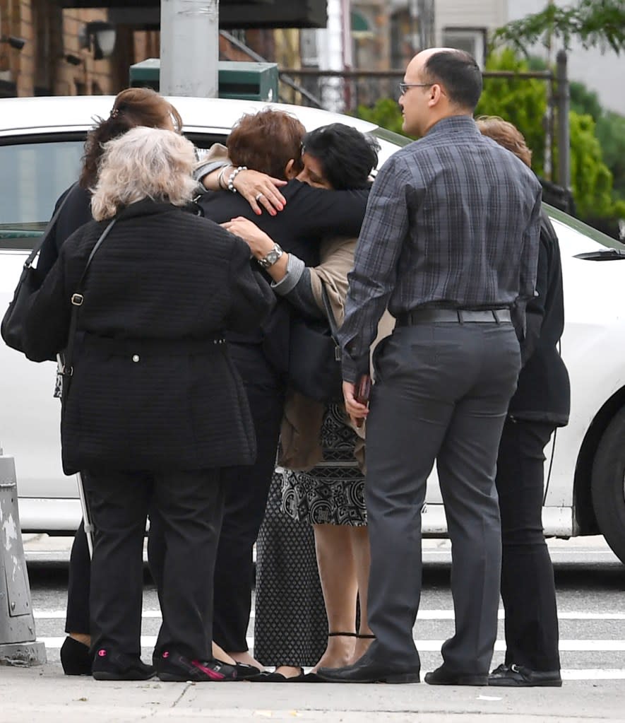 Family at the wake for Ana Devalle, 62, whose murder remains unsolved six years later. Paul Martinka