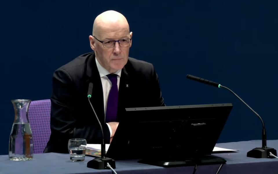 John Swinney giving evidence