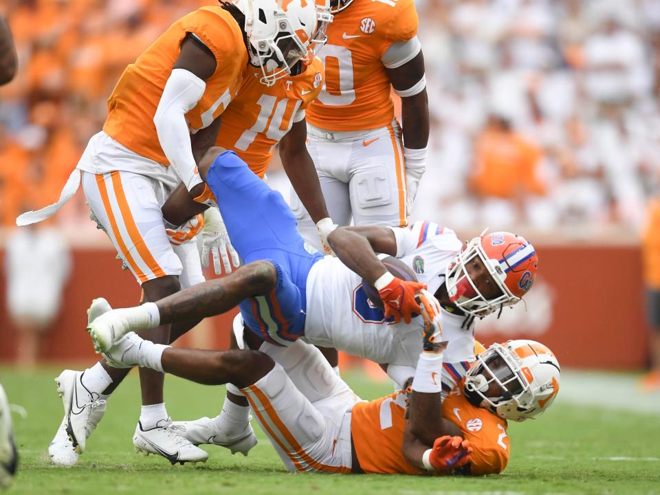 Tennessee defensive back Jaylen McCollough (2) pulls down Florida wide receiver Xzavier Henderson (3) during an NCAA college football game between on Saturday, September 24, 2022 in Knoxville, Tenn. 