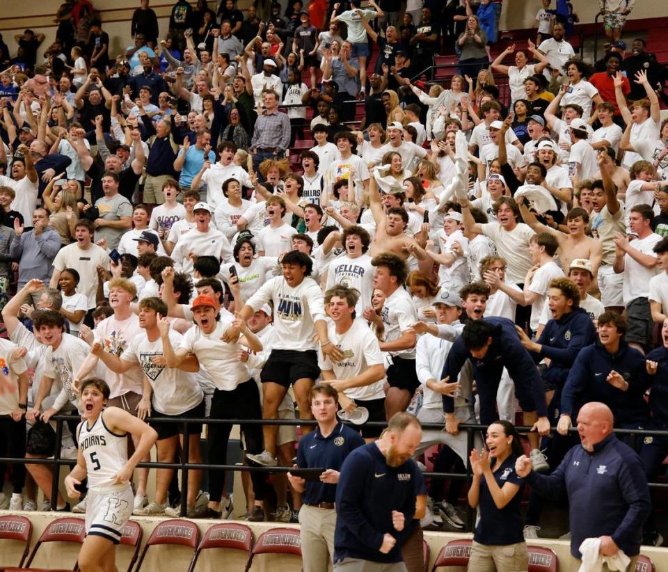 The Keller student section erupts as the Indians win the Conference 6A Region 1 quarterfinals basketball playoffs at Saginaw High School in Saginaw, Texas, Tuesday, Feb. 27, 2024.