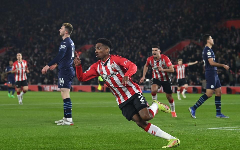 Southampton's English defender Kyle Walker-Peters celebrates after scoring the opening goal  - GLYN KIRK/AFP via Getty Images