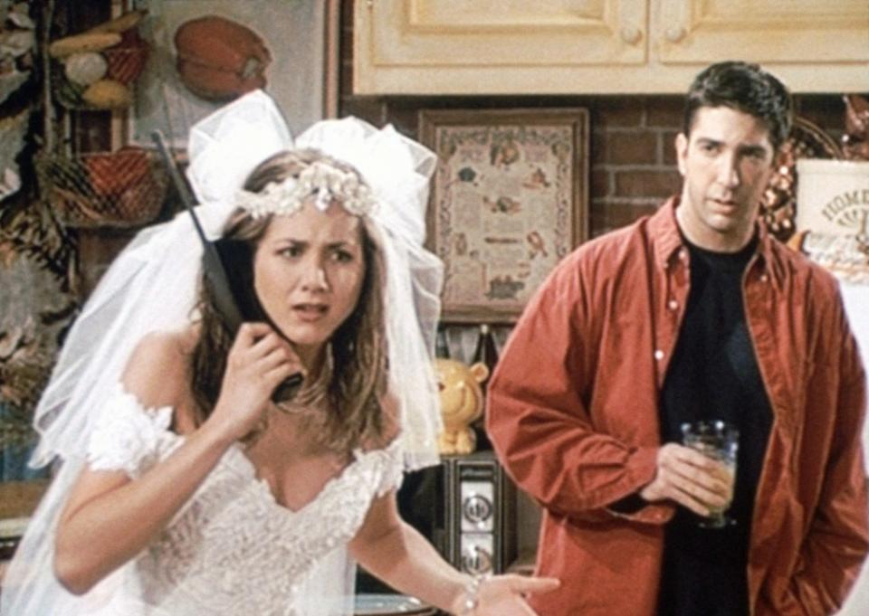 Aniston as Rachel Green, and Schwimmer as Ross Gellar, in “Friends” Warner Bros