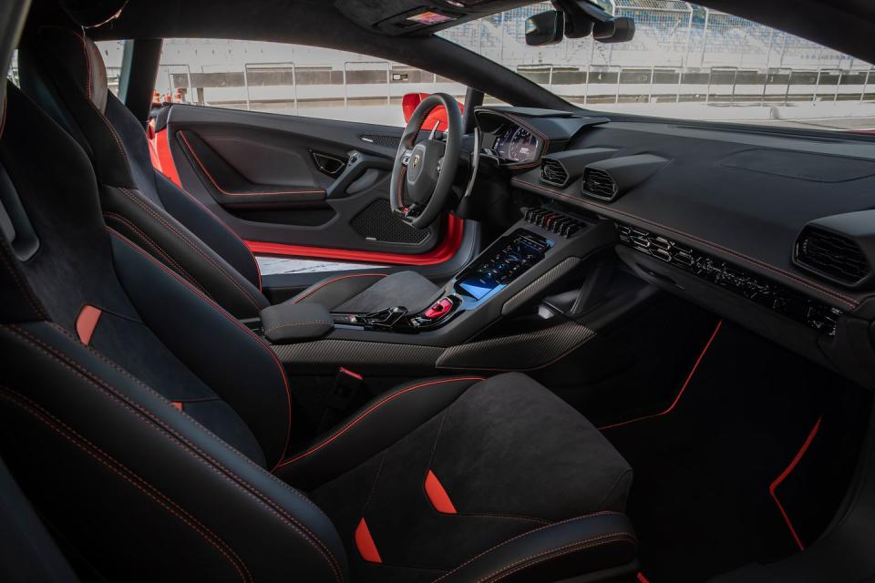 <p>The Evo still doesn't have the front-end bite of a Porsche 911 GT car, nor does it feel as intense as the double-edged sword that is <a rel="nofollow noopener" href="https://www.caranddriver.com/mclaren/720s" target="_blank" data-ylk="slk:the McLaren 720S;elm:context_link;itc:0;sec:content-canvas" class="link ">the McLaren 720S</a>. Compared to that Brit, which will burn an inattentive or sloppy driver, this Italian feels less emotional, less challenging, less attuned to the driver's intentions.</p>