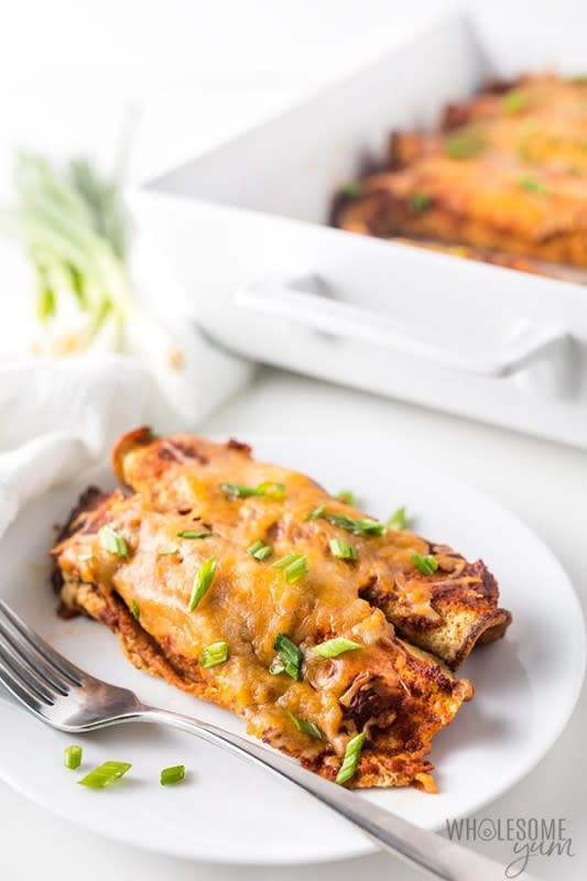 <p>Wholesome Yum</p><p>Step-by-step guide for how to make low-carb enchiladas with homemade low-carb tortillas, enchilada sauce, chicken and cheese.</p><p><strong>Get the recipe: </strong><a href="https://www.wholesomeyum.com/low-carb-chicken-enchiladas-recipe/" rel="nofollow noopener" target="_blank" data-ylk="slk:Low-Carb Chicken Enchiladas;elm:context_link;itc:0;sec:content-canvas" class="link "><strong>Low-Carb Chicken Enchiladas</strong></a></p>