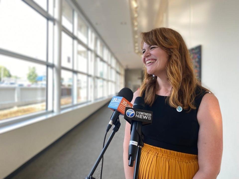 Lizzie Emmons, executive director of the Jackson Arts Council, speaks with reporters at The Ned.