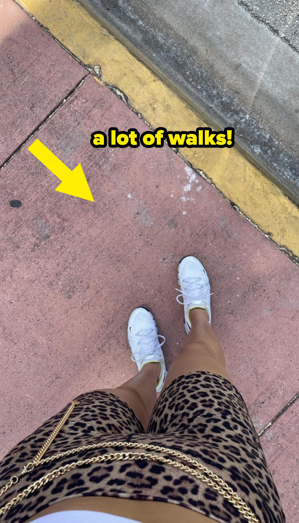 author's feet on the sidewalk